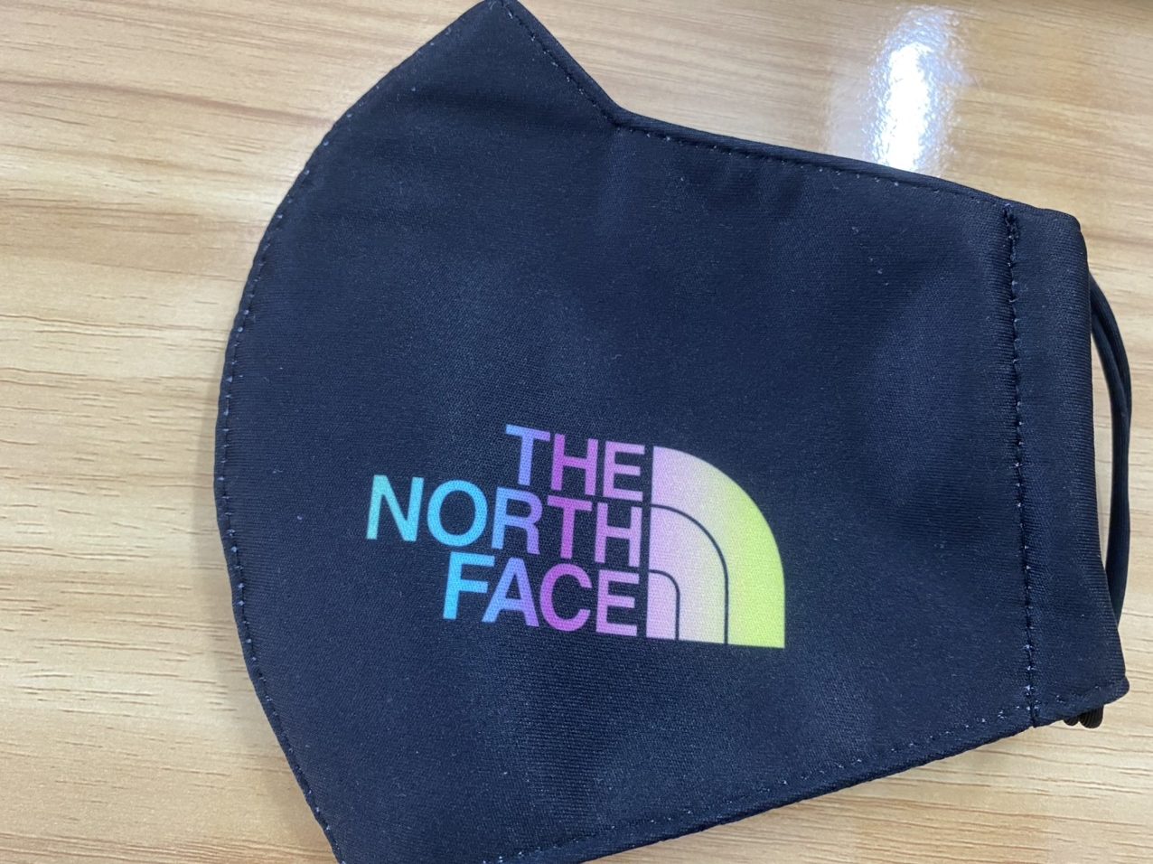khau trang vai in logo the north face 2 lop mau khau trang in 3d logo the north face nen xanh rotated